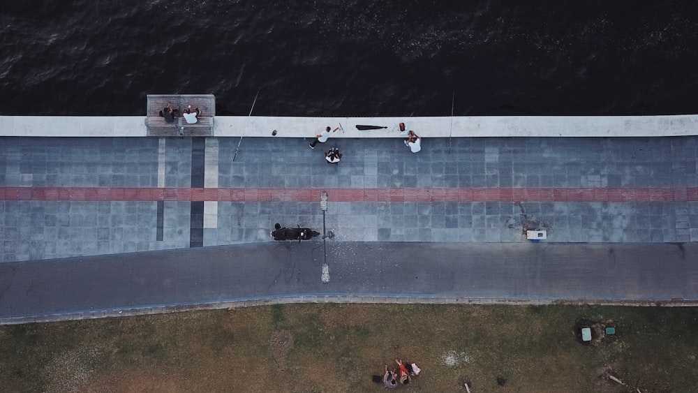 aerial photo of boardwalk near body of water