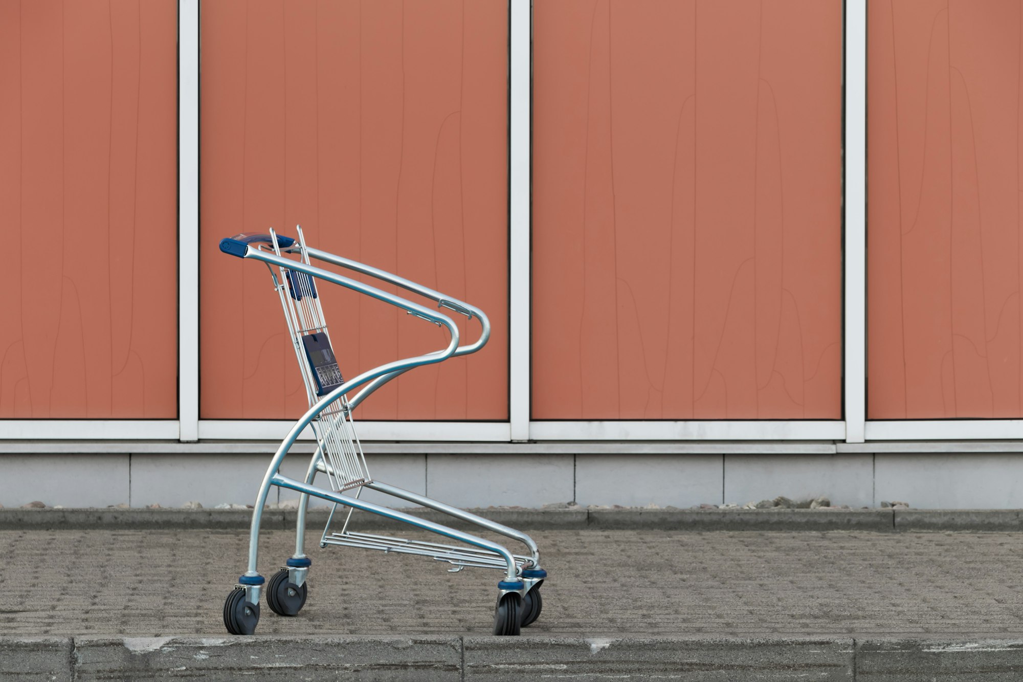 I was visiting an empty shopping center. I hope that people responsible for monitoring the security cameras feed don’t care about anyone photographing a trolley ;)