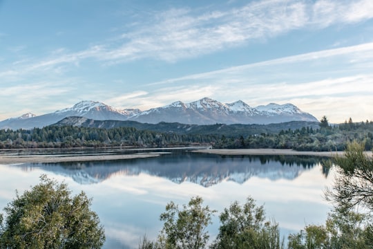 lake in distance of mountain and trees in Esquel Argentina