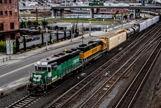 single locomotive on tract at daytime
