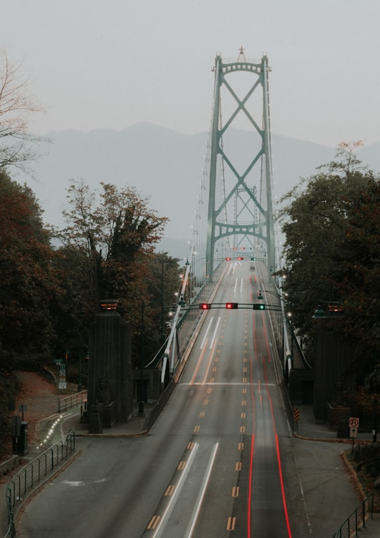 grey concrete bridge in Stanley Park Canada