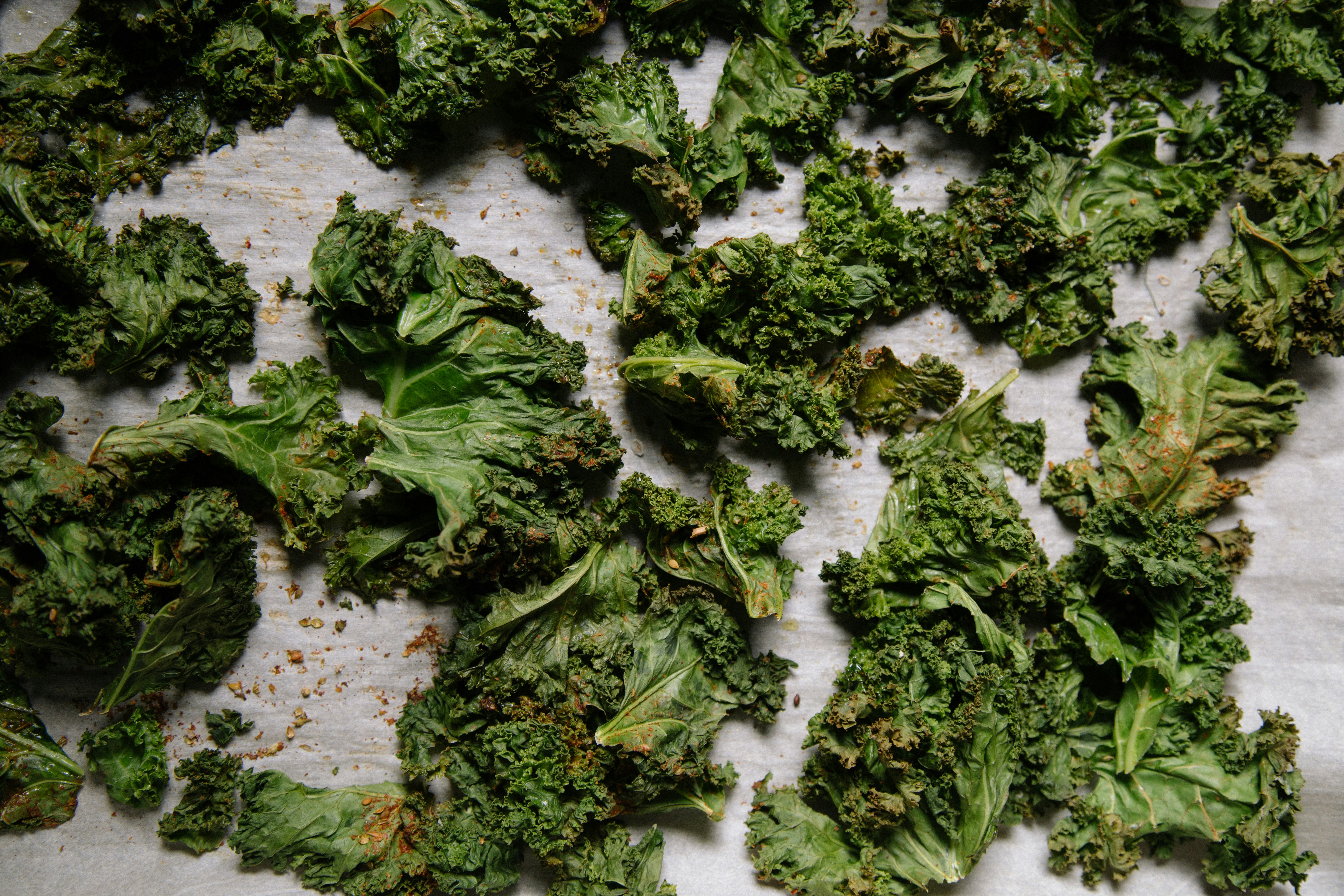 green vegetables on top of white board