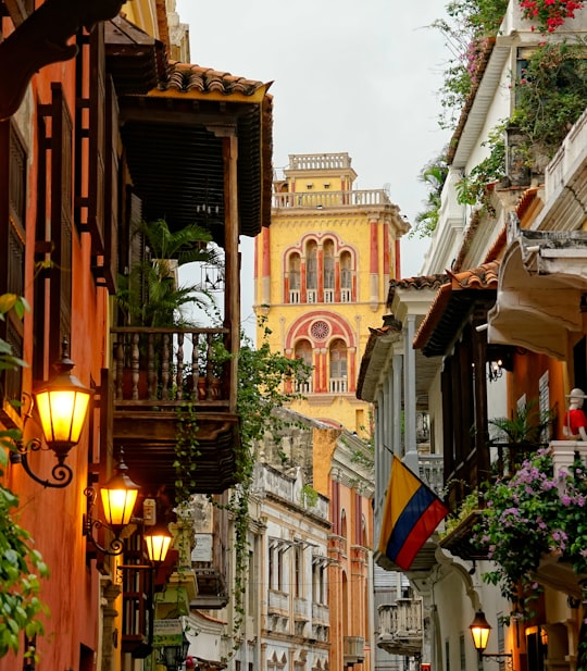 brown concrete houses under white sky at daytime in Cartagena Colombia