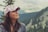 woman taking selfie on mountain