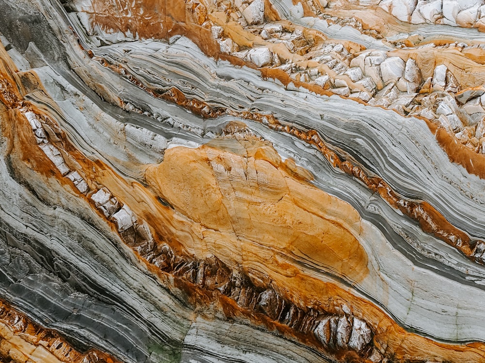 close-up photography of gray and orange stones