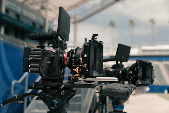 Cinematic camera setup with crew filming a commercial outdoors in Qatar