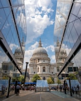 people near white dome-top building during day