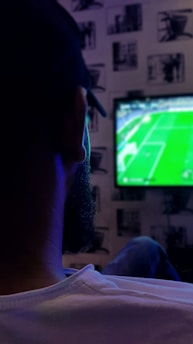 man watching soccer game