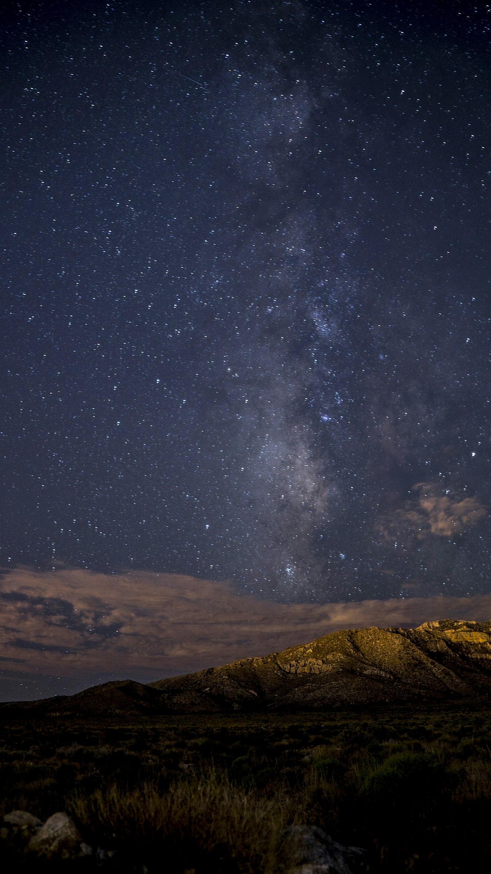 Sony a7S II + Sony Distagon T* FE 35mm F1.4 ZA sample photo. Brown mountain during night photography