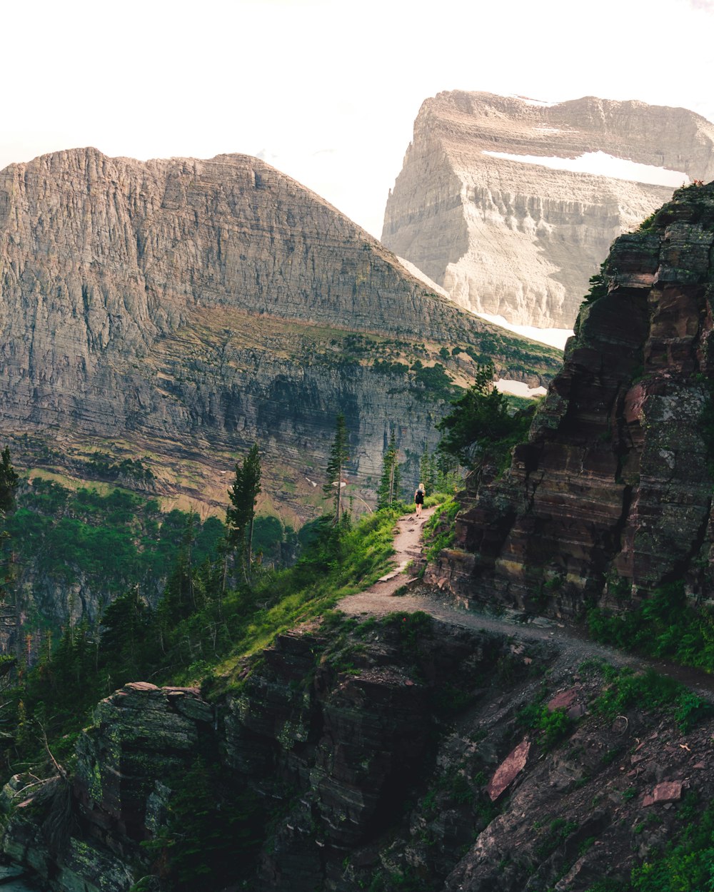 pathway on brown cliff