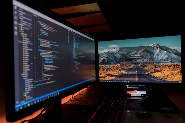 An image displaying a monitoring setup with multiple screens.