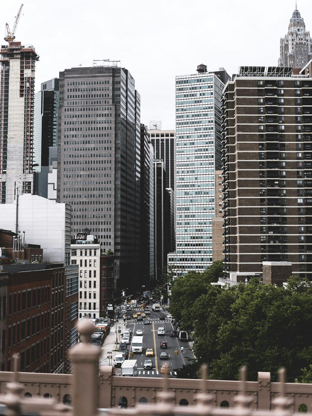 photo of brown and white high rise buildings during daytime