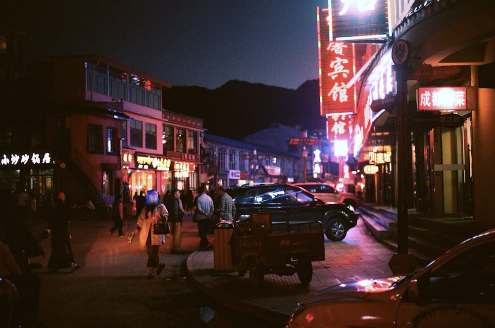 people on street near mountains