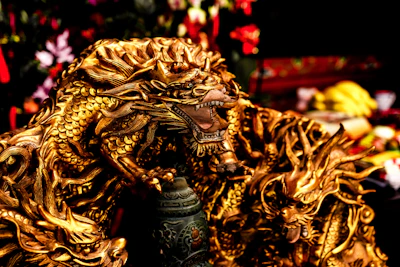 Close-up of a golden dragon art piece glowing with vibrant energy.