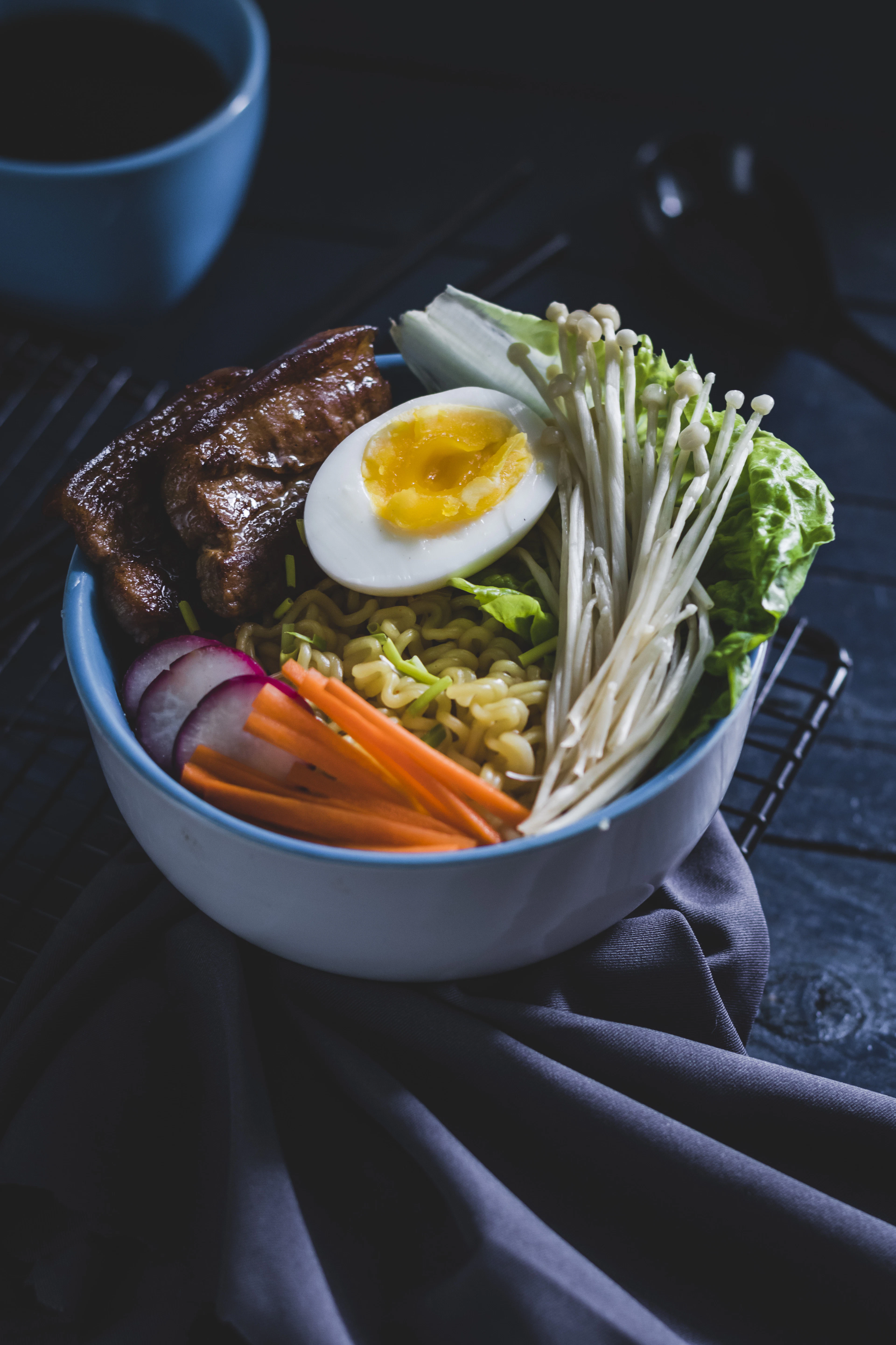 A composed bowl with tofu and vegetables