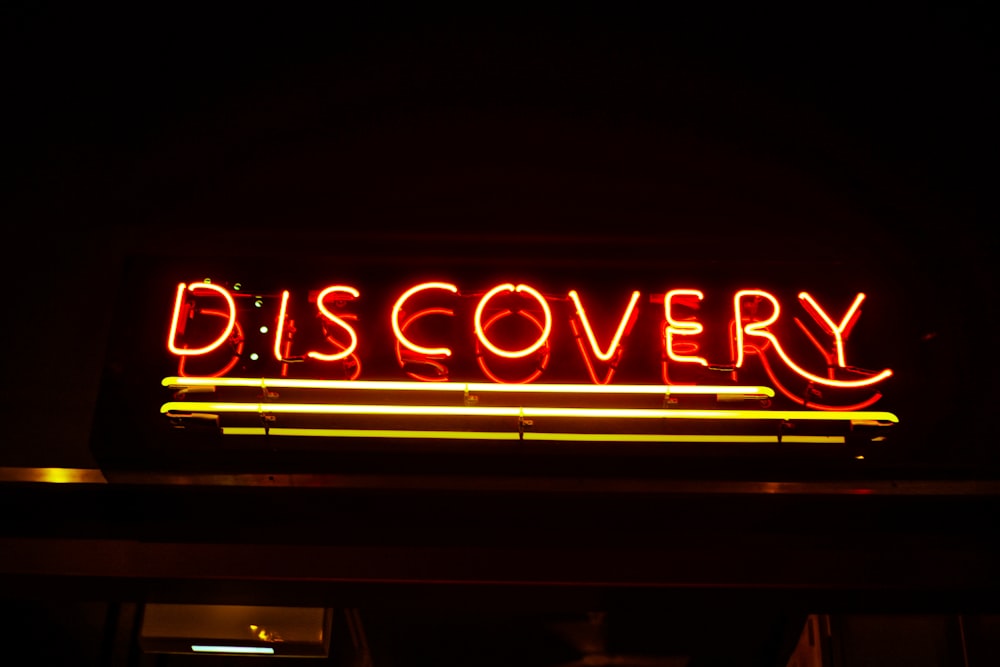 lighted red Discovery neon signage
