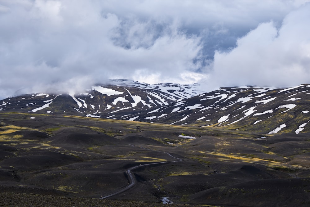 snow-covered mountain during daytime