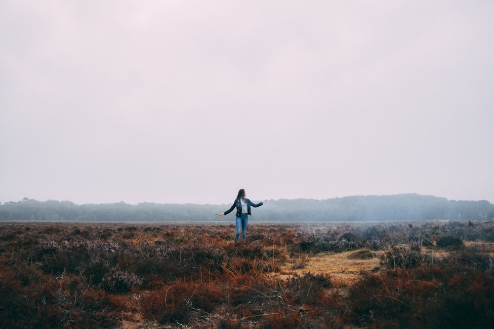 woman standing on field