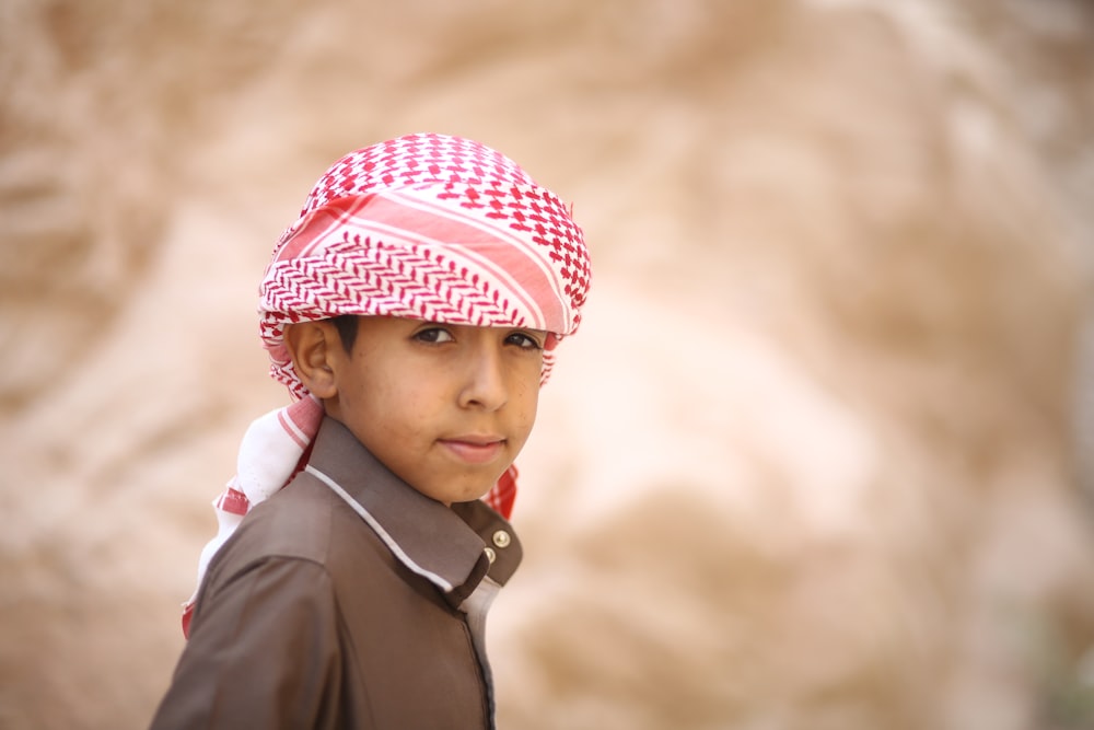 boy in brown collar top