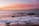 body of water during sunset