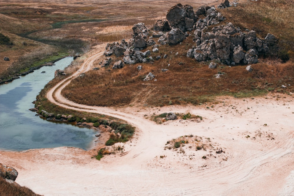 aerial photography of black rocks on ground