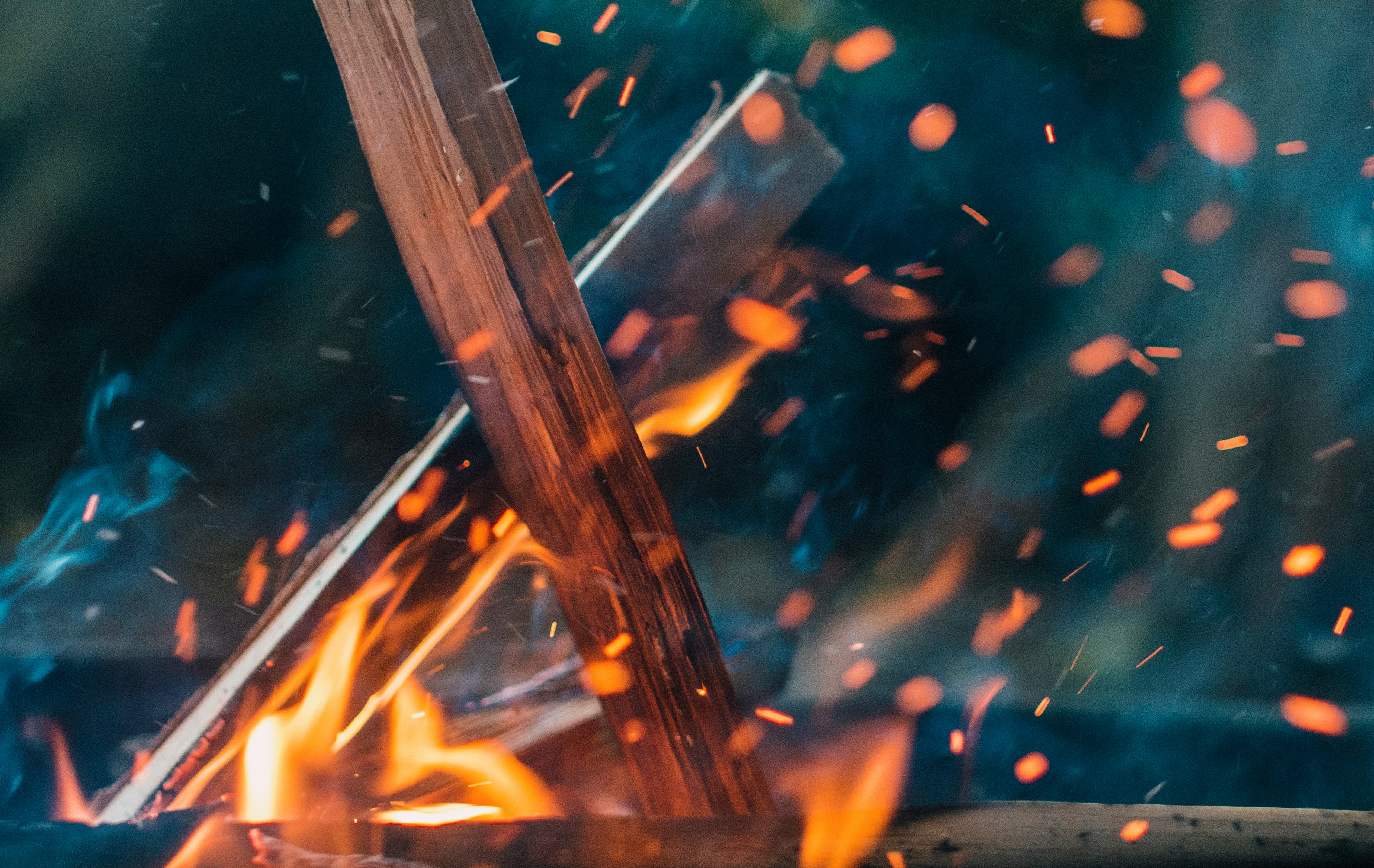 burning wood during nighttime painting