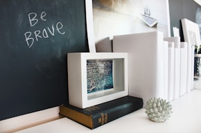 hardbound book near wall