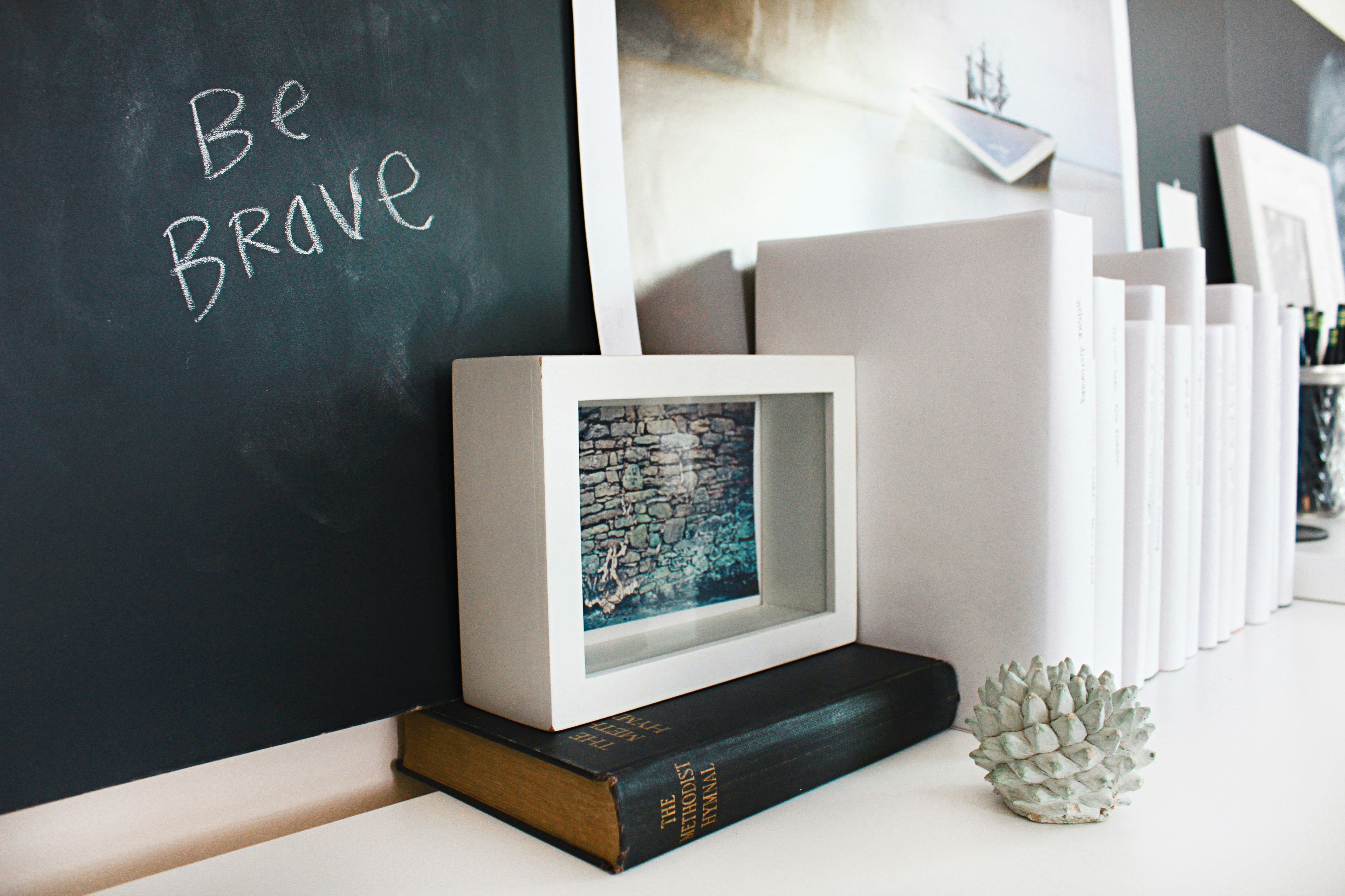 Home office with chalkboard and books