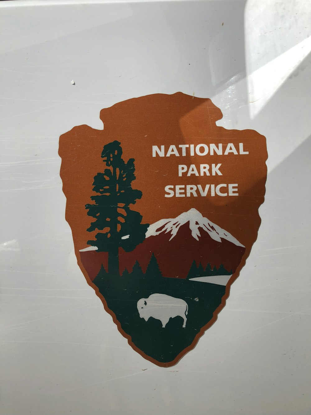close-up of National Park Service logo