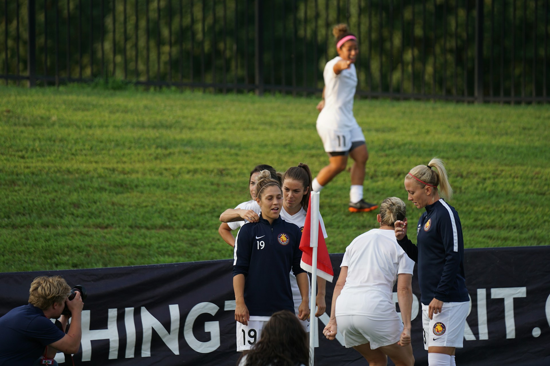woman wearing yellow long-sleeved dress under white clouds and blue sky during daytime