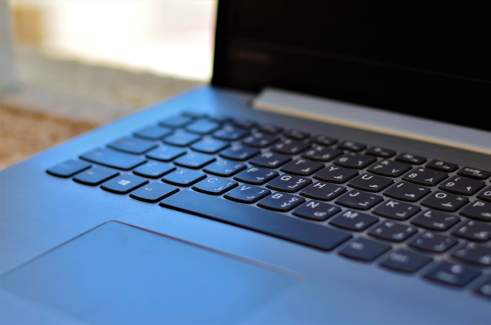 selective focus photography of laptop