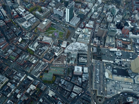 Aerial view of a vibrant city with diverse demographics.