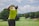 man playing golf during daytime