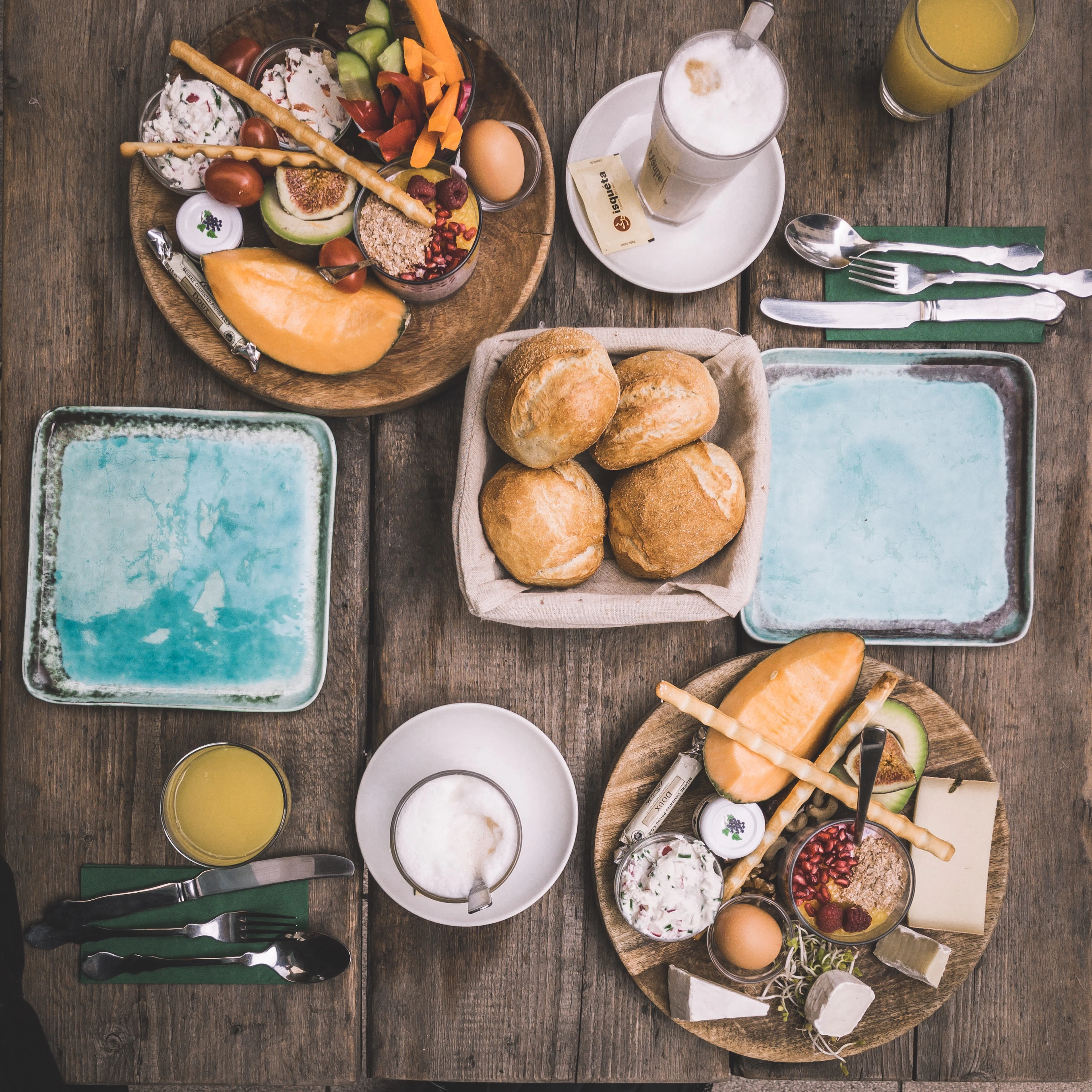 A full Turkish breakfast table spread with many small plates seen from above