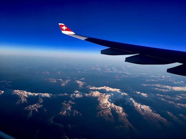 white and blue plane