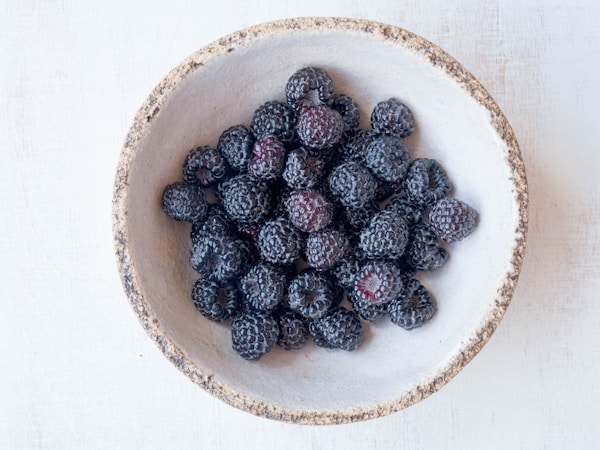 Raspberries on bowl