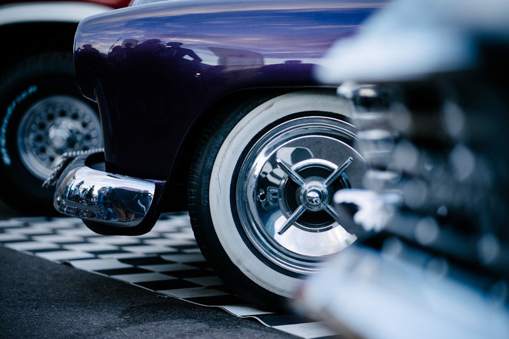 close-up photo of vehicles on black and white mat