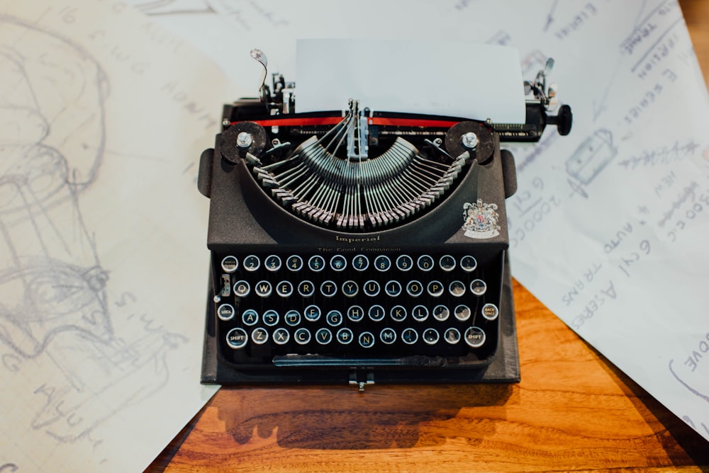 photo of black typewriter on table