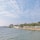 A calm coastal landscape symbolizing community and regional development.