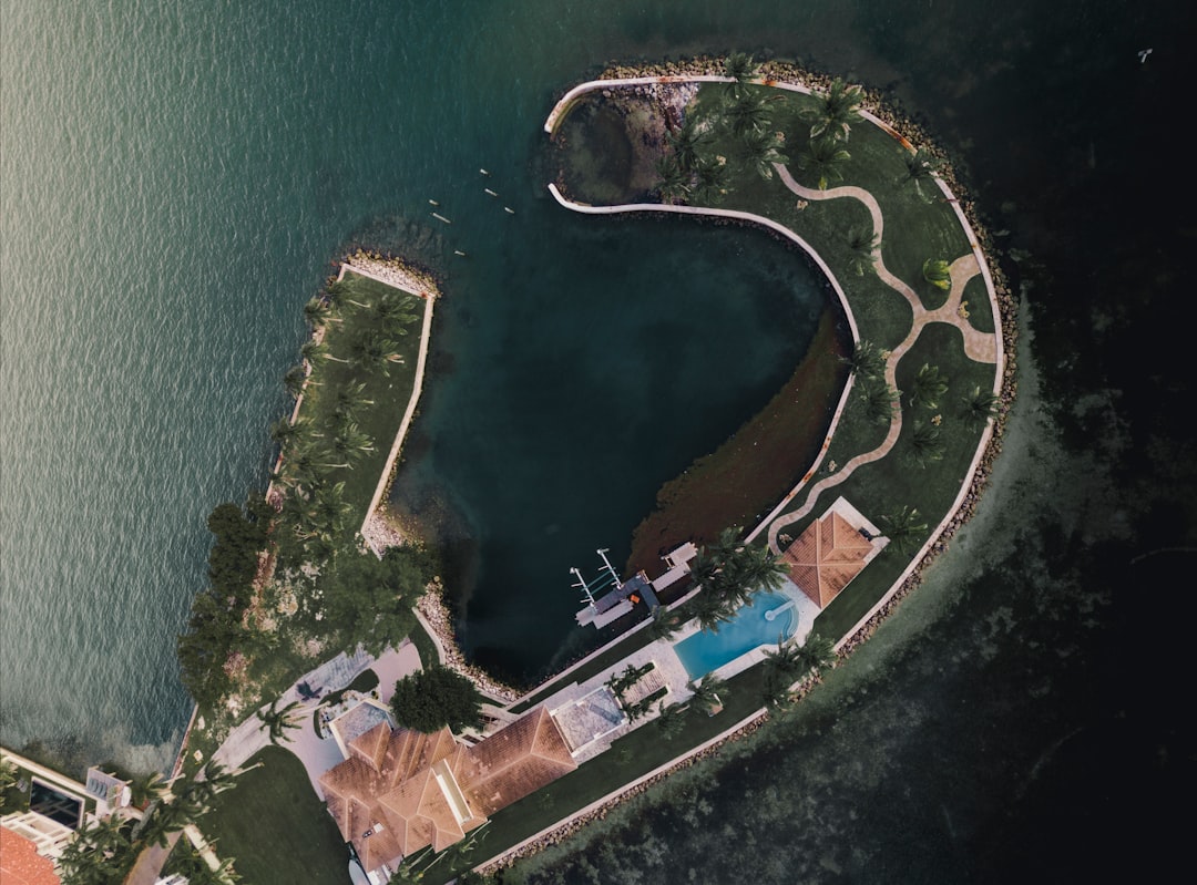 aerial view photography of isle, Garden next to the Ocean