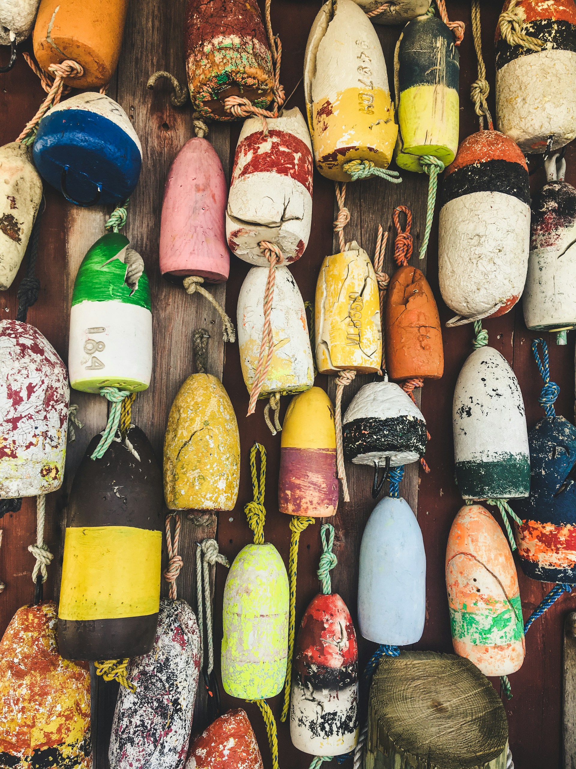 assorted-color bottle decor lot on brown surface