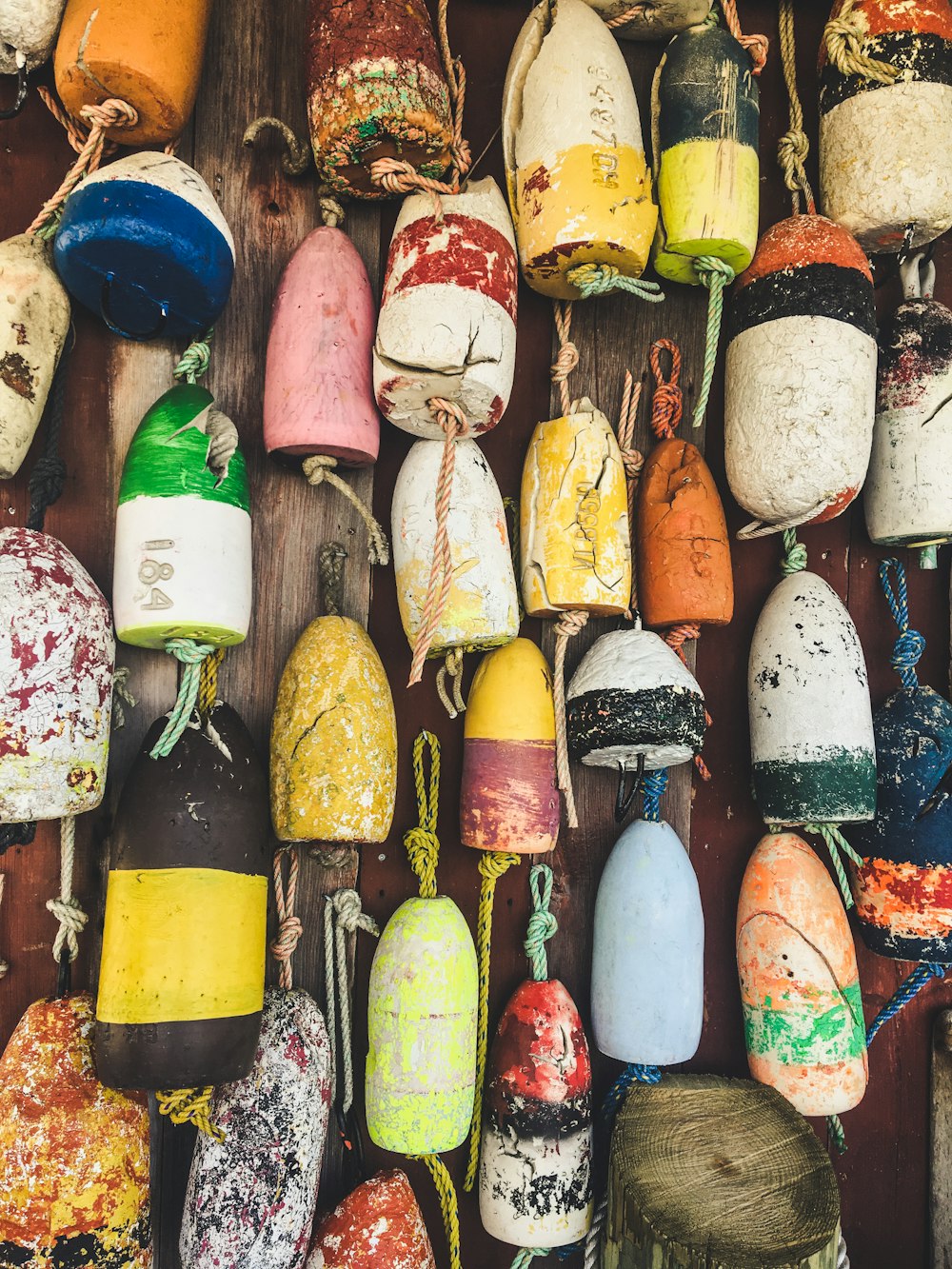 assorted-color bottle decor lot on brown surface