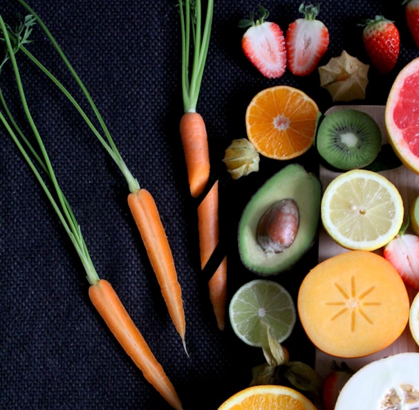 sliced vegetable and fruits on board