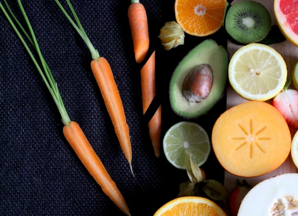 sliced vegetable and fruits on board