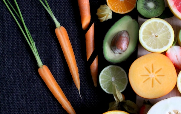 sliced vegetable and fruits on board