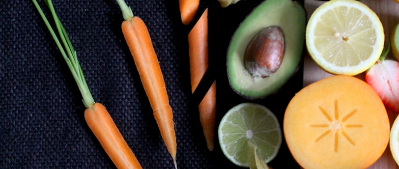 sliced vegetable and fruits on board