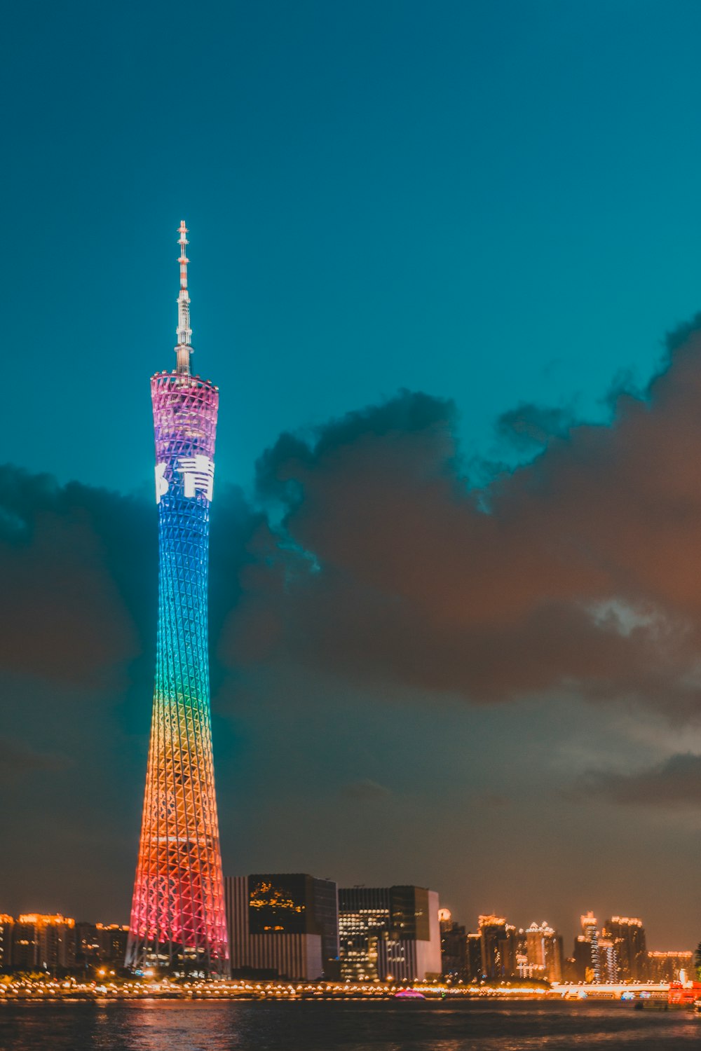 lighted high-rise tower at golden hour