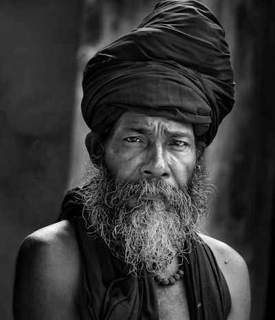 man wearing black turban hat