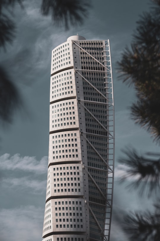 white high rise building in Turning Torso Building Sweden