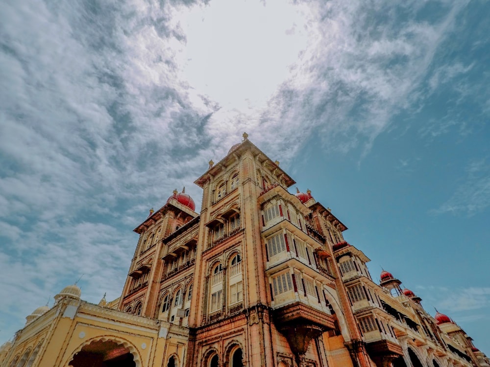 low angle photo of brown high-rise building